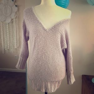 Knit light purple sweater.
